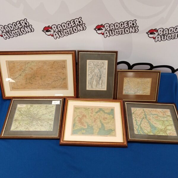 Framed antique Scottish maps showcasing vintage cartography and historical detail.