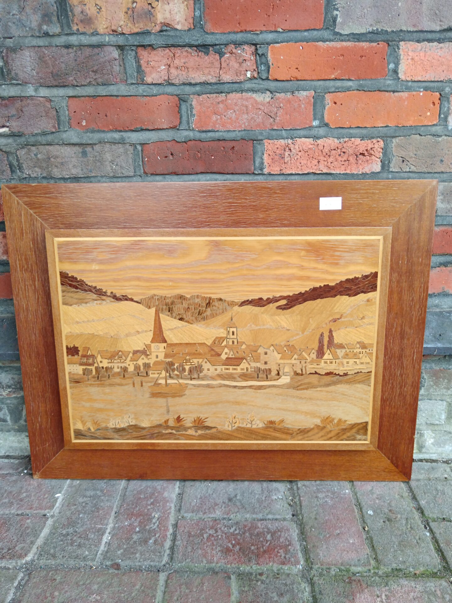 696 Large marquetry panel signed f f of a lake side village with churches