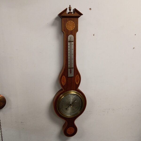 Antique Edwardian barometer by O C London, showing silvered dial.