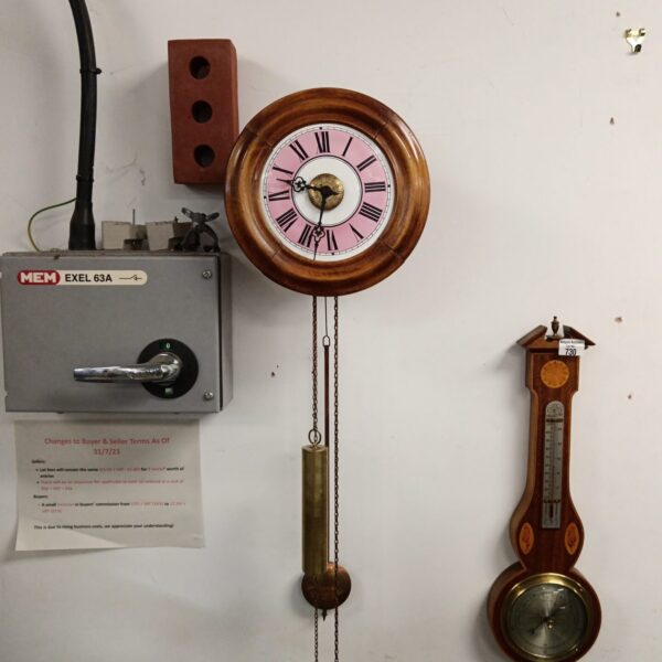 Antique Victorian post office wall clock with weights and pendulum.