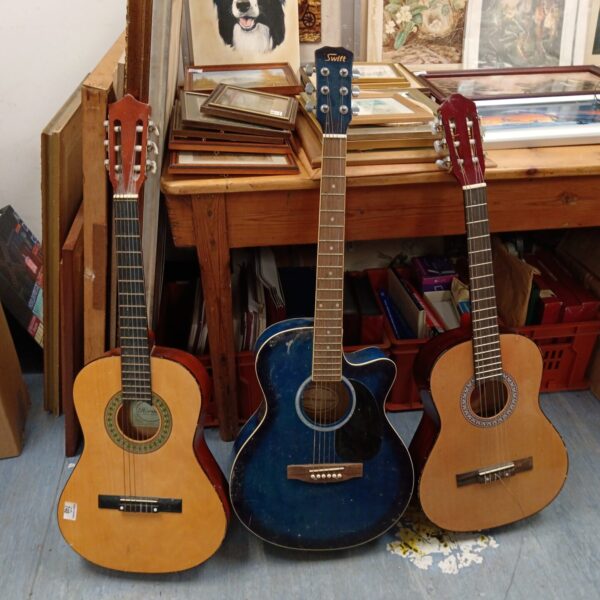Lot of three vintage acoustic guitars, Herald, Swift, and El Primo.
