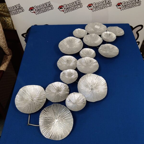 Set of metal lily pad wall art for botanical home decor.