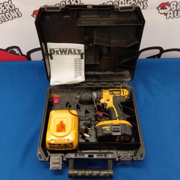 Used DeWalt 18v cordless drill in auction condition, ideal for collectors.