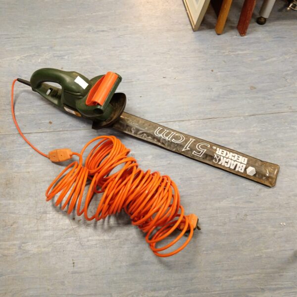 Black & Decker 51cm electric hedge cutter for garden trimming.
