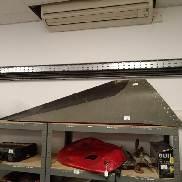 Metal aircraft tail fin deflector, likely from a Tornado.
