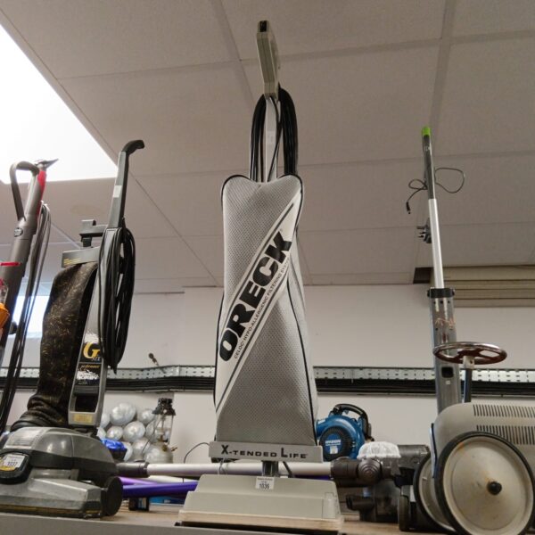Oreck Xtend Life upright vacuum cleaner in used condition.
