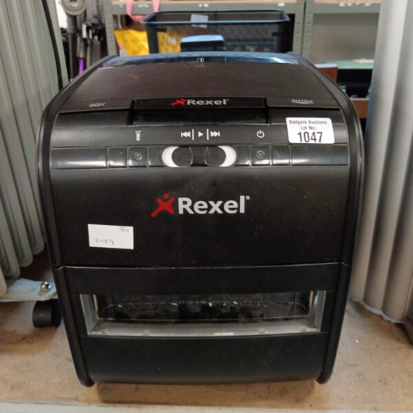 Black Rexel paper shredder for secure document disposal.