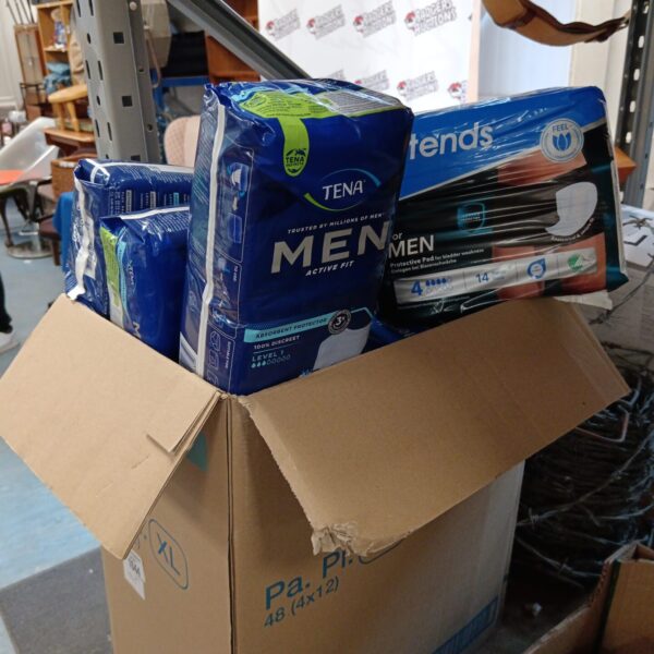 Bulk lot of Tena Men protective pads for incontinence.