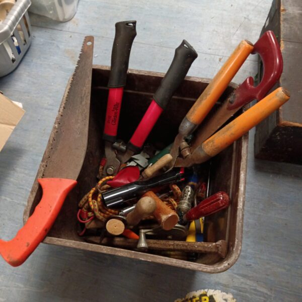 Vintage mixed tool lot with hand saw and shears for garden and DIY.
