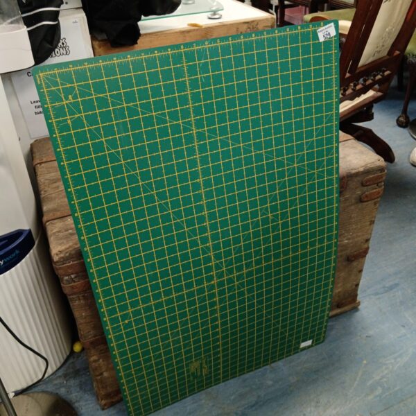 Large Trimit cutting mat for crafting and quilting projects.