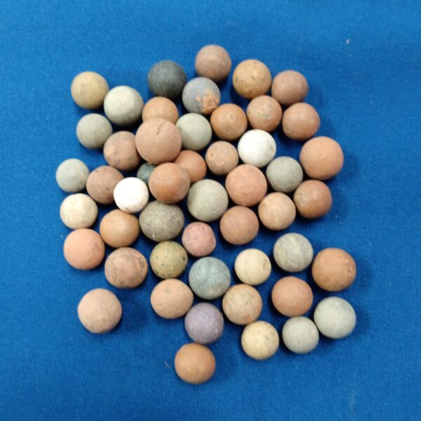 Close-up of a vintage lot of colourful stone marbles.