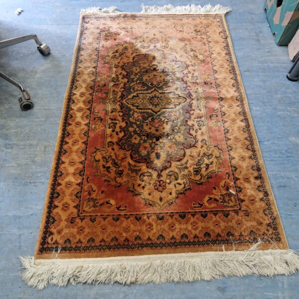 Vintage red runner rug with Persian design.