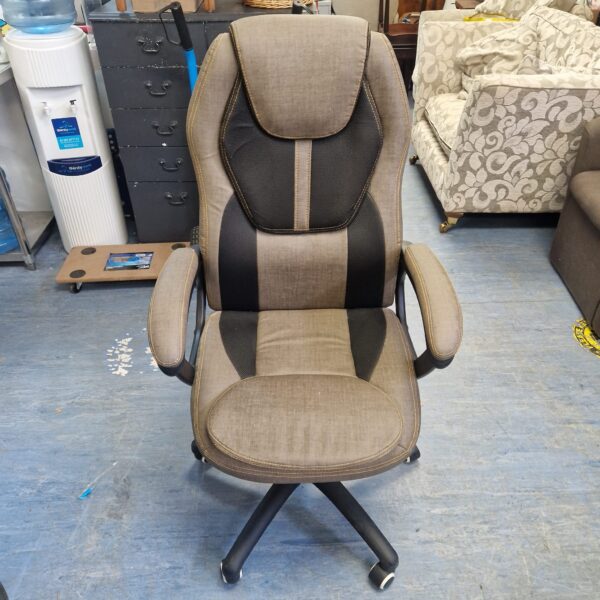 Black and grey gaming chair with high backrest and swivel base.