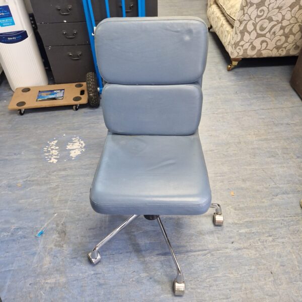 Vintage blue office chair with swivel base and leather upholstery.