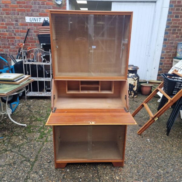 Vintage mahogany glass fronted desk with display section.