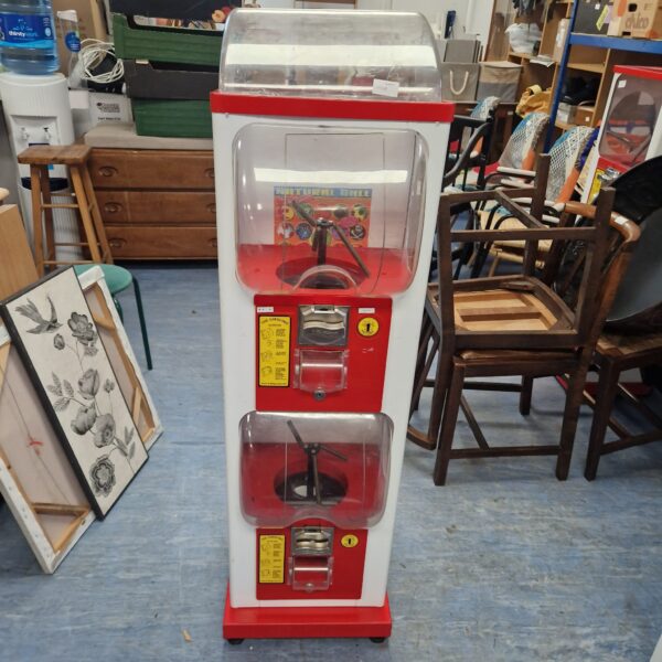 Vintage Gacher toy dispenser, colourful plastic retro toy machine.