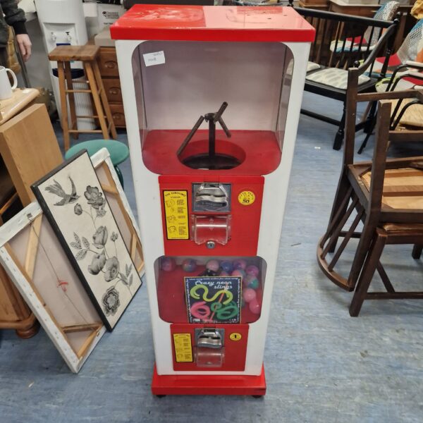 Vintage Gacher toy dispenser, a colourful retro capsule toy machine.