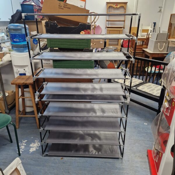 Lot of two canvas shoe racks for organized shoe storage.