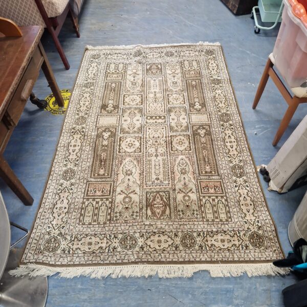 Vibrant floral Aztec patterned rug, vintage style home decor.