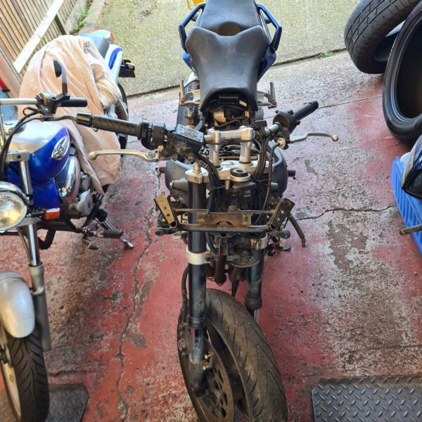 Detailed view of the Yamaha Phaser engine for restoration.
