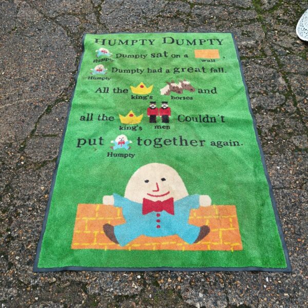Vintage Humpty Dumpty rug for children's playroom or nursery.