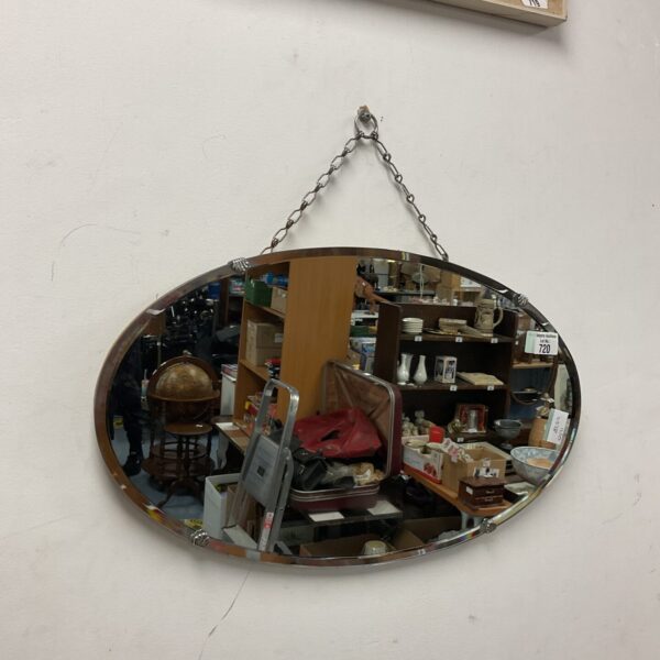 Vintage mid-century modern mirror with bevelled edge.