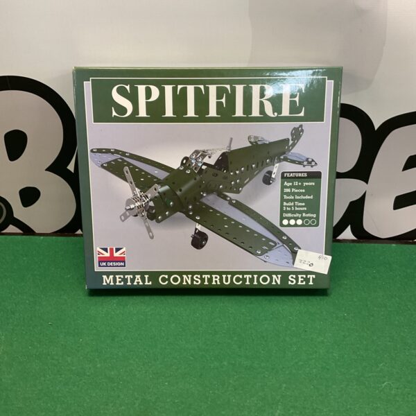 Vintage Spitfire metal construction set with numerous parts.