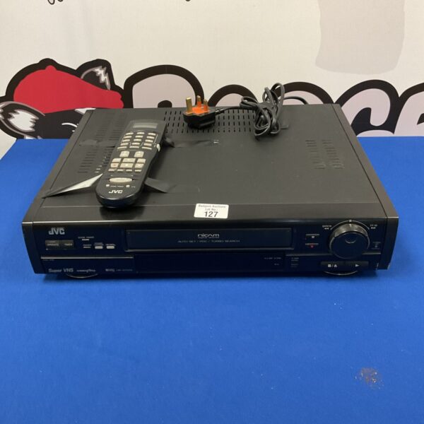 Front view of a JVC Super VHS player, vintage video equipment.