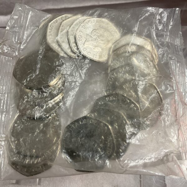 Sealed bank bag of Beatrix Potter 50p coins for collectors.