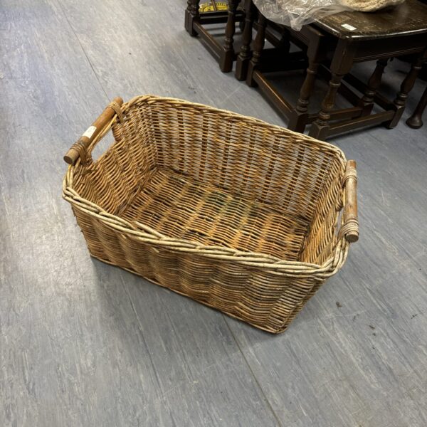 Large handwoven wicker basket for farmhouse style storage and decor.