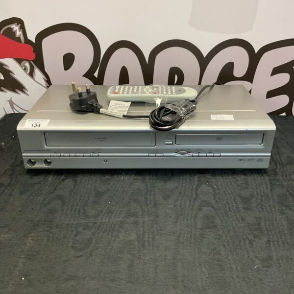Duraband DVD player with remote control, vintage electronics.