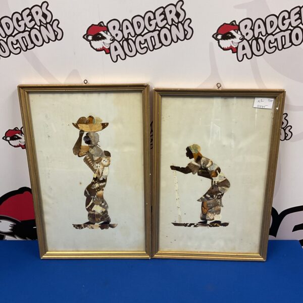 Pair of framed butterfly wing artworks in African style.