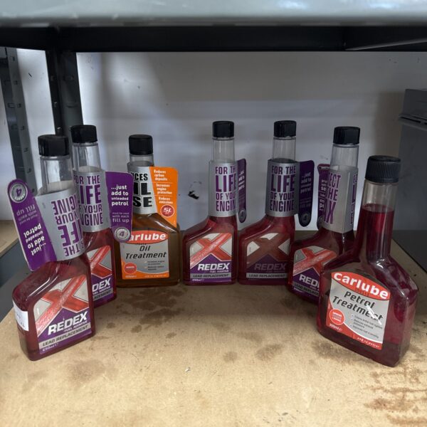 Selection of car fuel additives including Redex for engine maintenance.