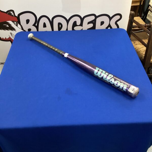 Wilson Optima baseball bat for youth players, showing signs of use.