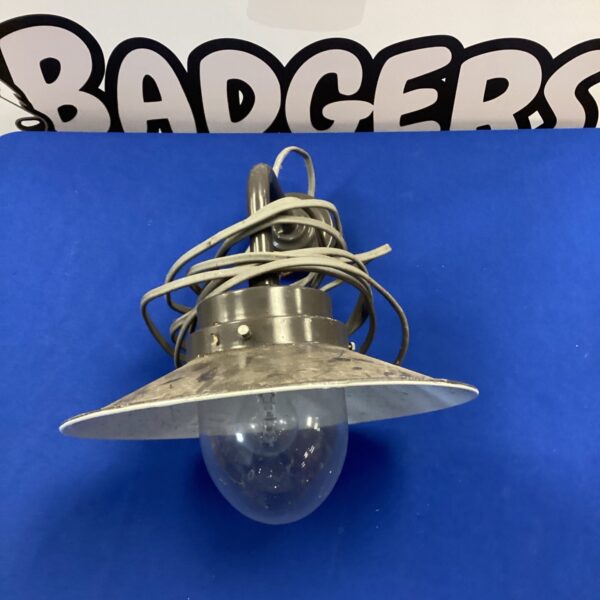 Vintage enamel outdoor wall light with a classic industrial design.