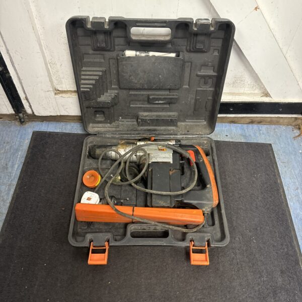 Vintage Challenge hammer drill in its original carry case.