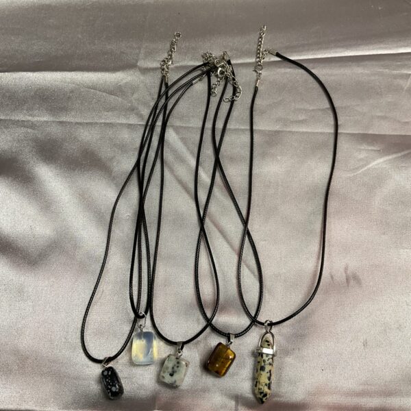 Moonstone crystal necklace with black rope cord.