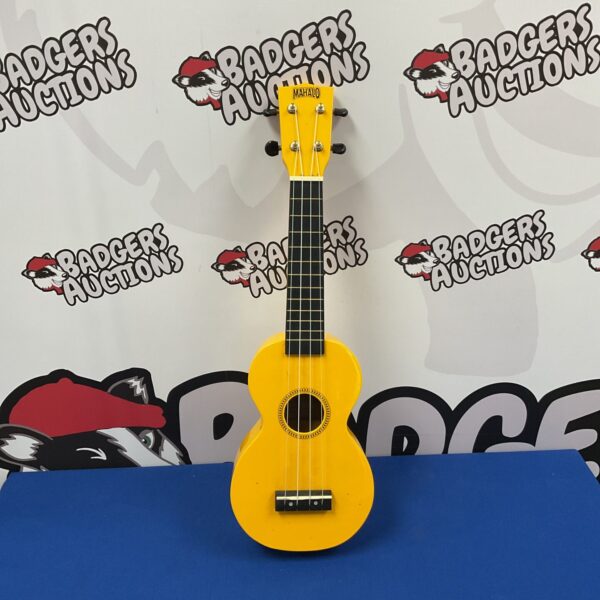 Yellow Mahalo MR1VW soprano ukulele, a beginner-friendly musical instrument.