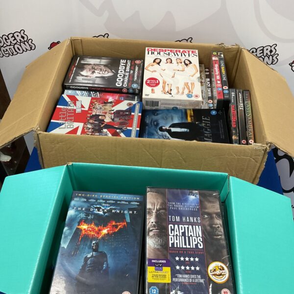 DVD lot featuring The Dark Knight and Captain Phillips films.