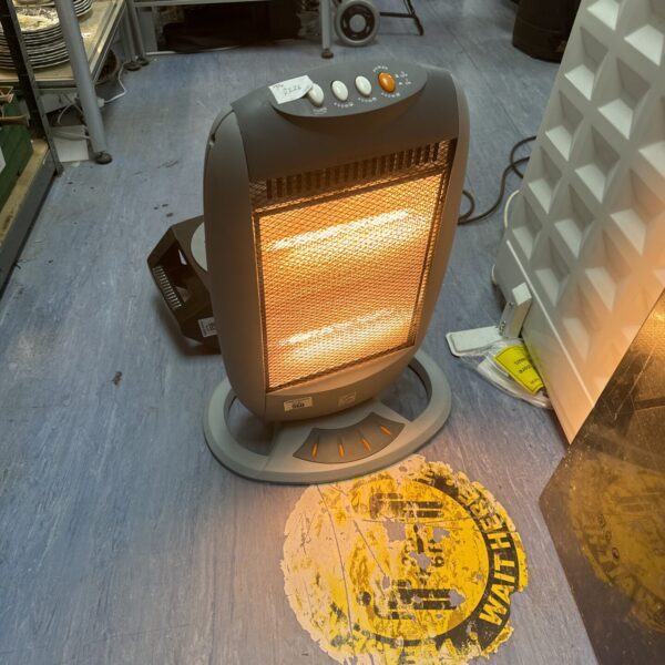 Front view of a vintage Glen halogen convection heater.