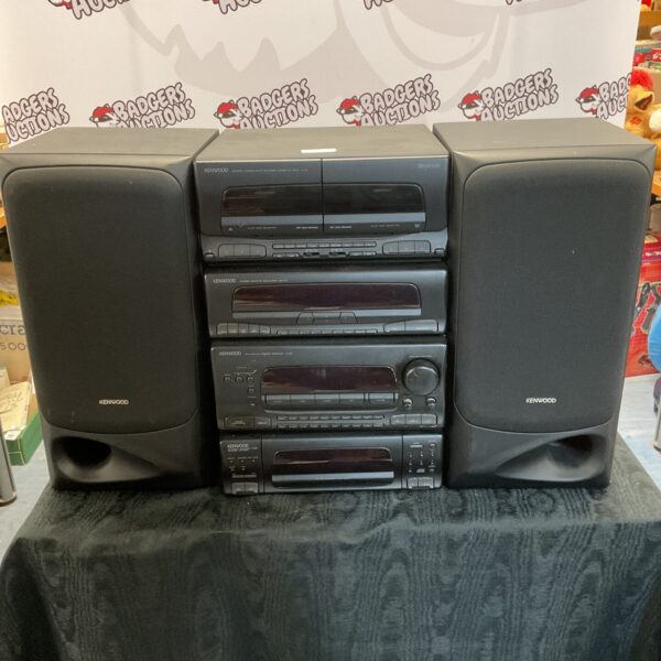Vintage Kenwood stack audio system with amplifier and CD player.