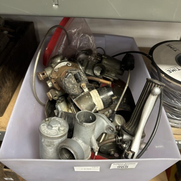 Box of vintage motorcycle parts