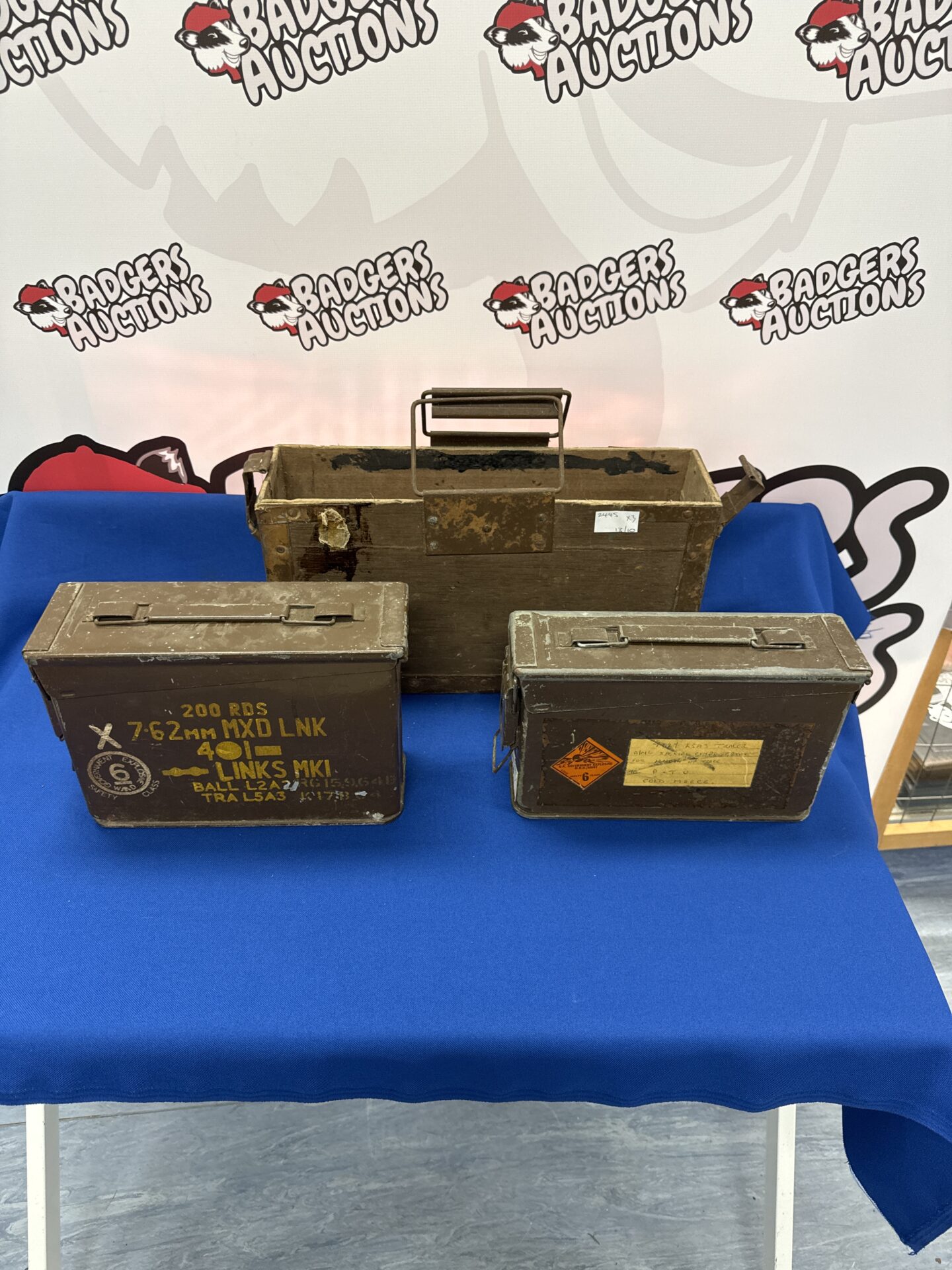 969 Two small ammo tins with a wooden box