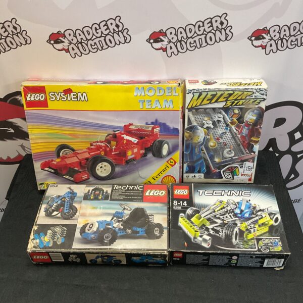 Boxed Lego Technic sets including Ferrari and model 854.