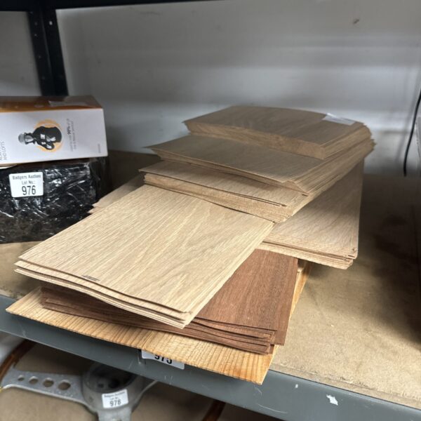 Selection of hardwood wood veneer strips for woodworking projects.