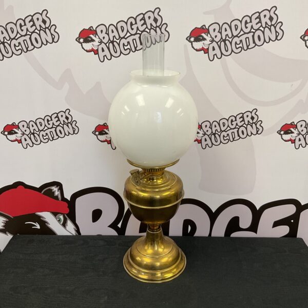 Vintage brass duplex oil lamp with glass shades.