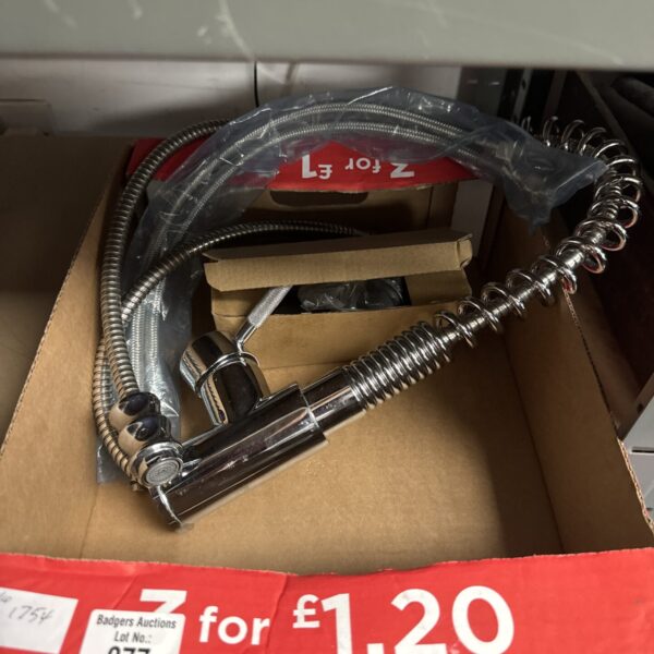 Chrome extendable kitchen mixer tap with flexible tails.