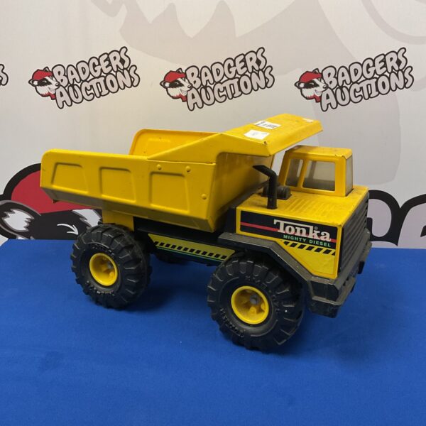 Yellow Tonka Mighty Diesel tipper truck, vintage toy truck.