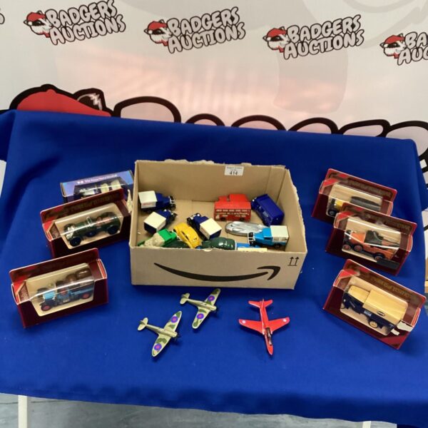 Vintage Matchbox model cars and planes in a lot.