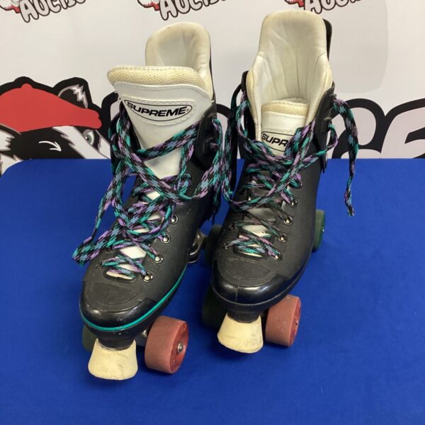 Vintage quad roller boots with colourful laces and wheels.